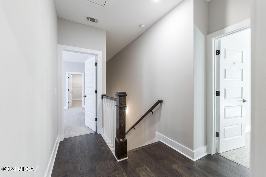 411 Crescent Drive Forsyth, GA 31029 - Photo 34 of 57 a view of a hallway with empty room
