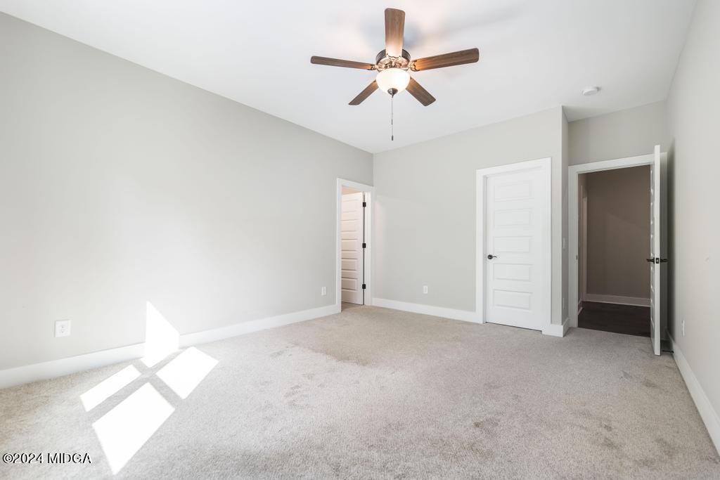 411 Crescent Drive Forsyth, GA 31029 - Photo 45 of 57 wooden floor in an empty room