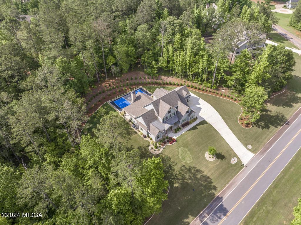 411 Crescent Drive Forsyth, GA 31029 - Photo 5 of 57 an aerial view of a house with a yard