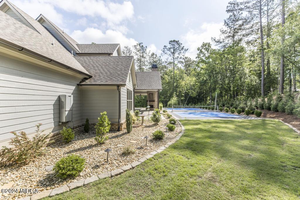 411 Crescent Drive Forsyth, GA 31029 - Photo 53 of 57 a view of backyard of house