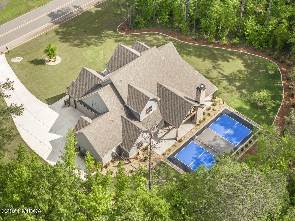 411 Crescent Drive Forsyth, GA 31029 - Photo 54 of 57 an aerial view of a house with swimming pool and outdoor space