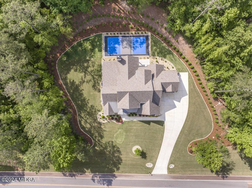 411 Crescent Drive Forsyth, GA 31029 - Photo 57 of 57 a view of a house with a swimming pool