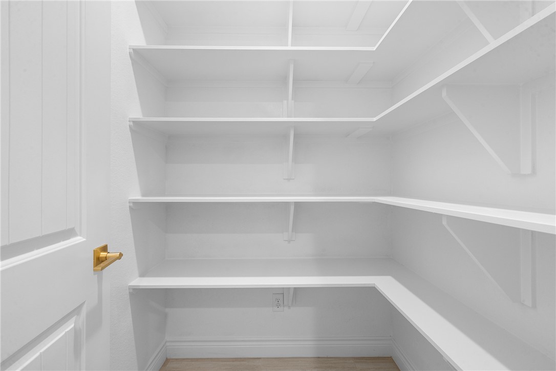 6524 Agave Court Bryan, TX 77808 - Photo 22 of 43 a view of walk in closet with empty racks