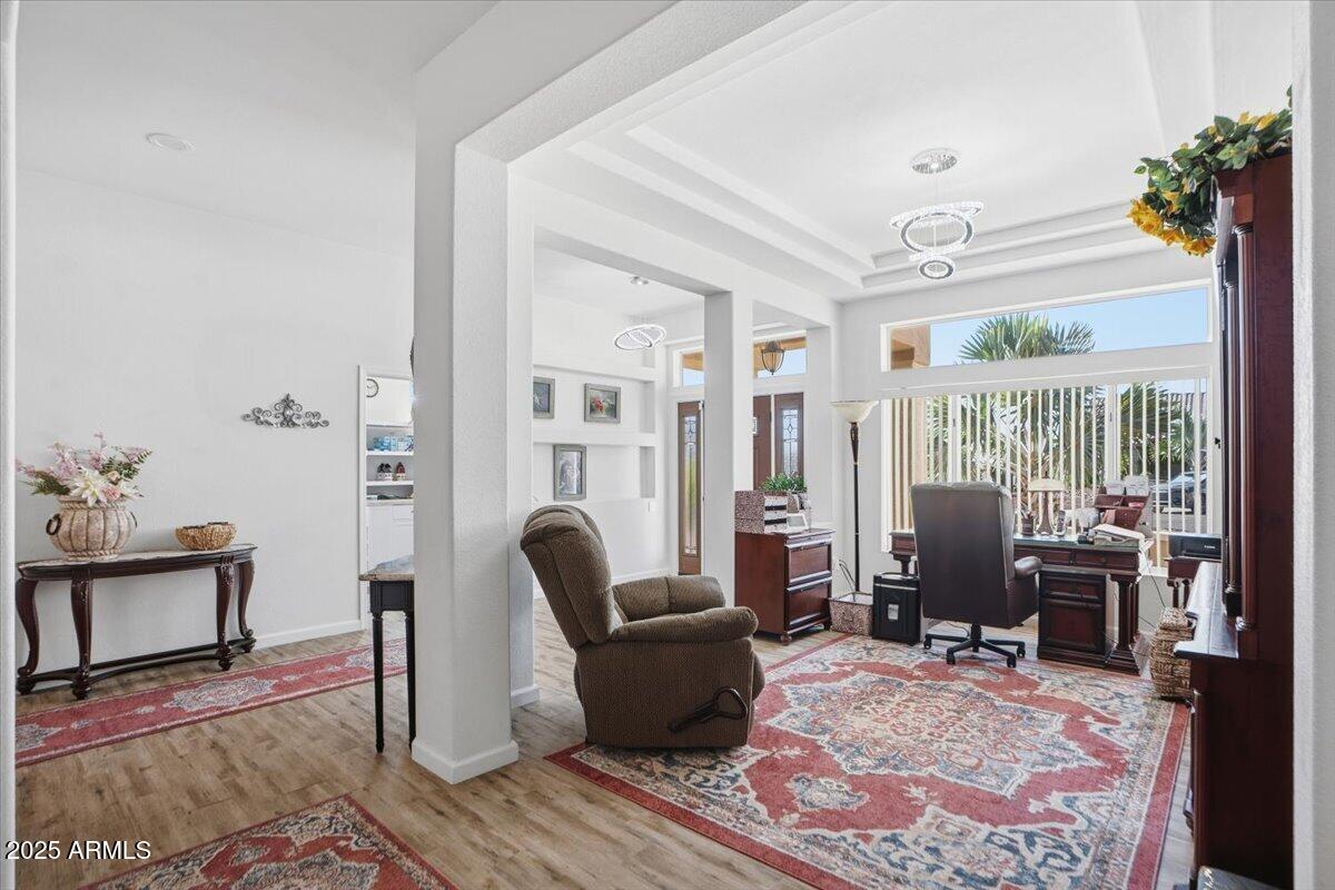 22318 North Dusty Trail Boulevard Sun City West, AZ 85375 - Photo 14 of 66 a living room with furniture lamp and rug