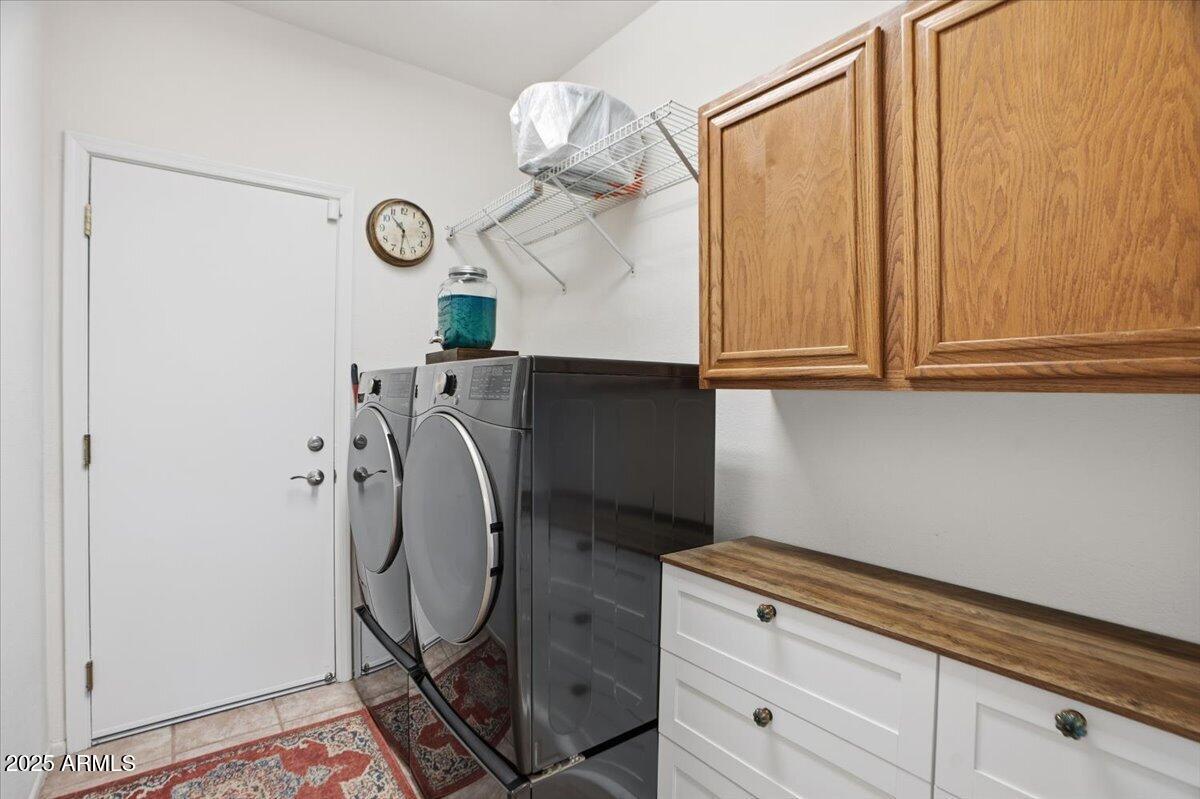 22318 North Dusty Trail Boulevard Sun City West, AZ 85375 - Photo 38 of 66 a view of hallway with washer and dryer