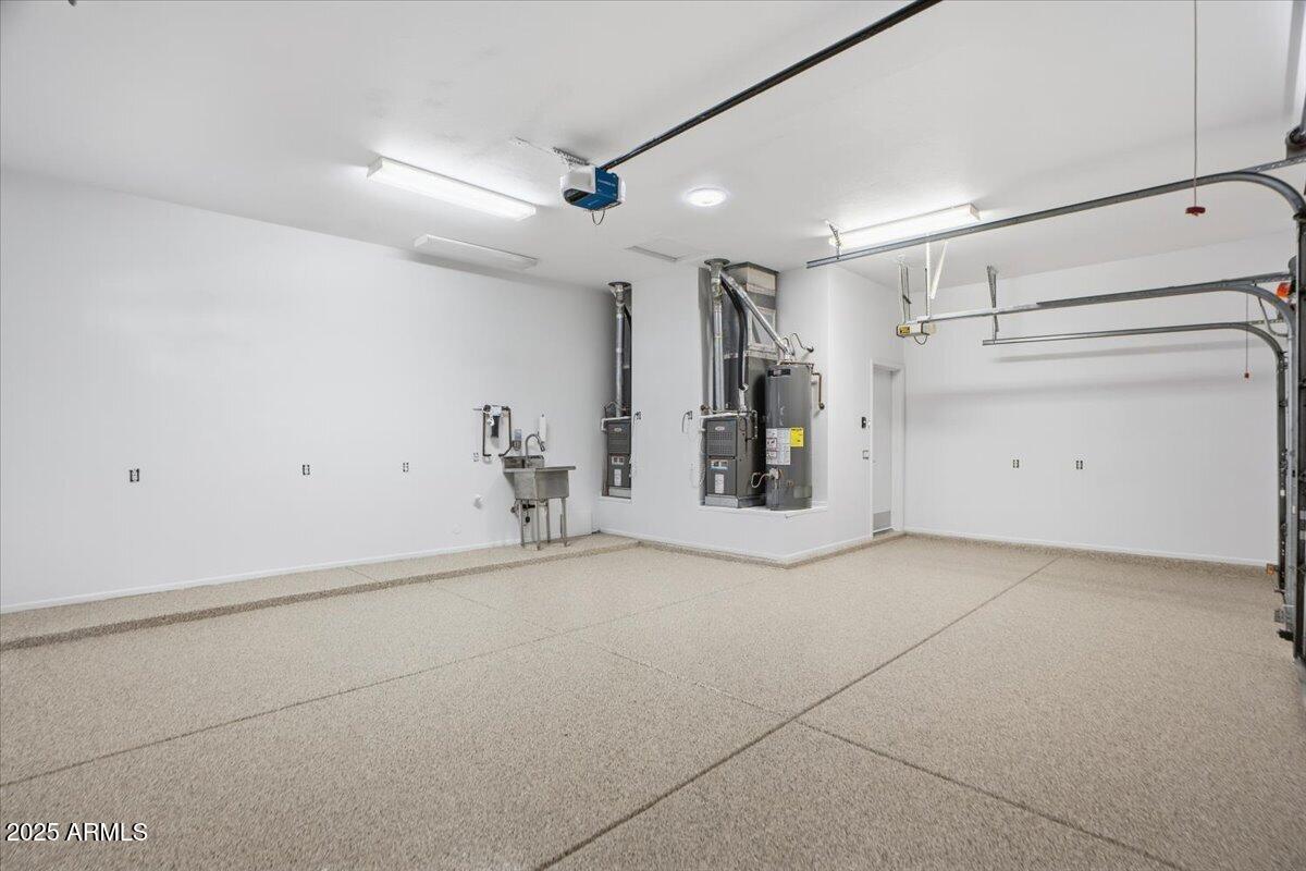 22318 North Dusty Trail Boulevard Sun City West, AZ 85375 - Photo 39 of 66 a view of garage