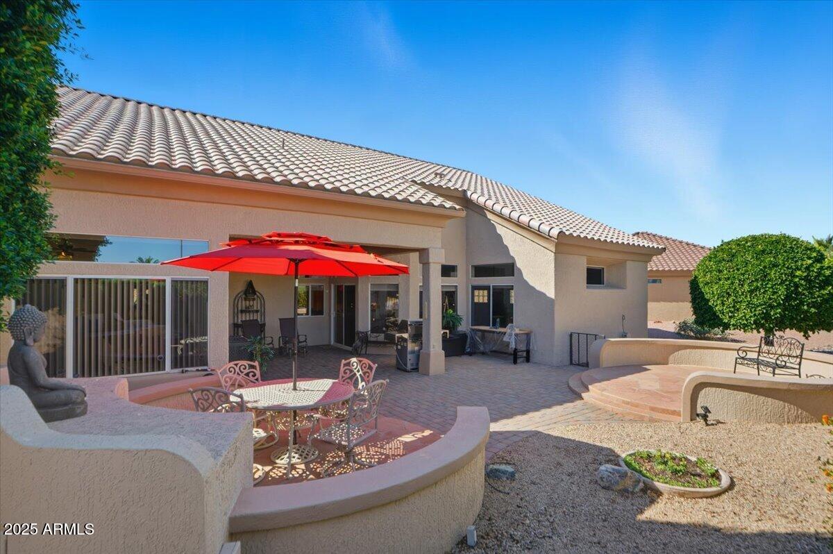22318 North Dusty Trail Boulevard Sun City West, AZ 85375 - Photo 46 of 66 a view of a house with a patio