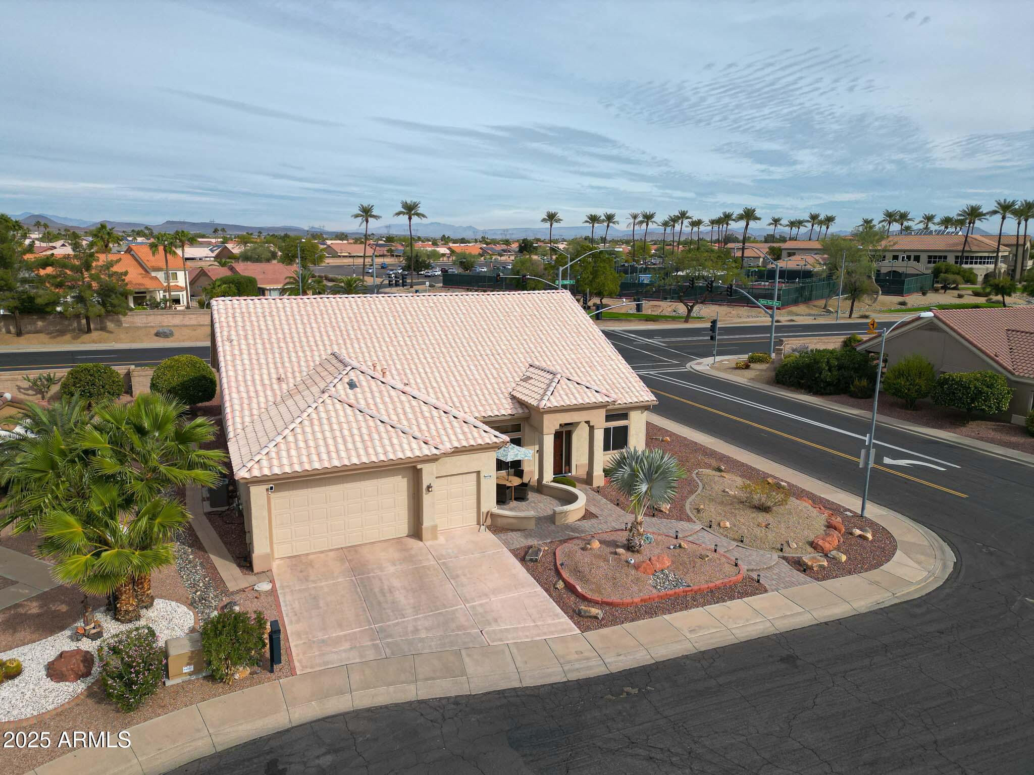 22318 North Dusty Trail Boulevard Sun City West, AZ 85375 - Photo 49 of 66 an aerial view of a house with a garden