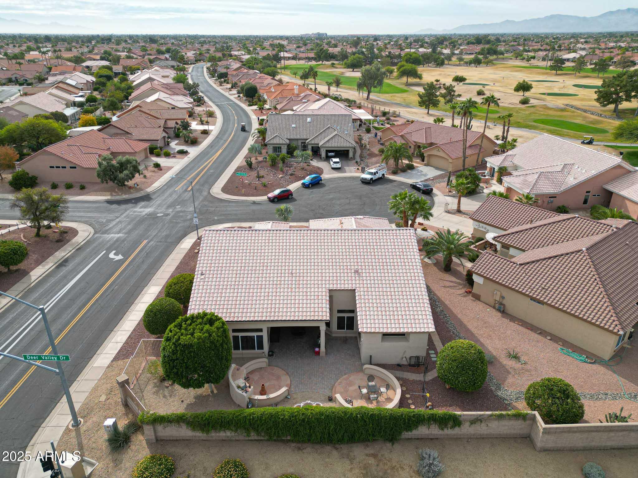 22318 North Dusty Trail Boulevard Sun City West, AZ 85375 - Photo 55 of 66 an aerial view of residential houses with outdoor space