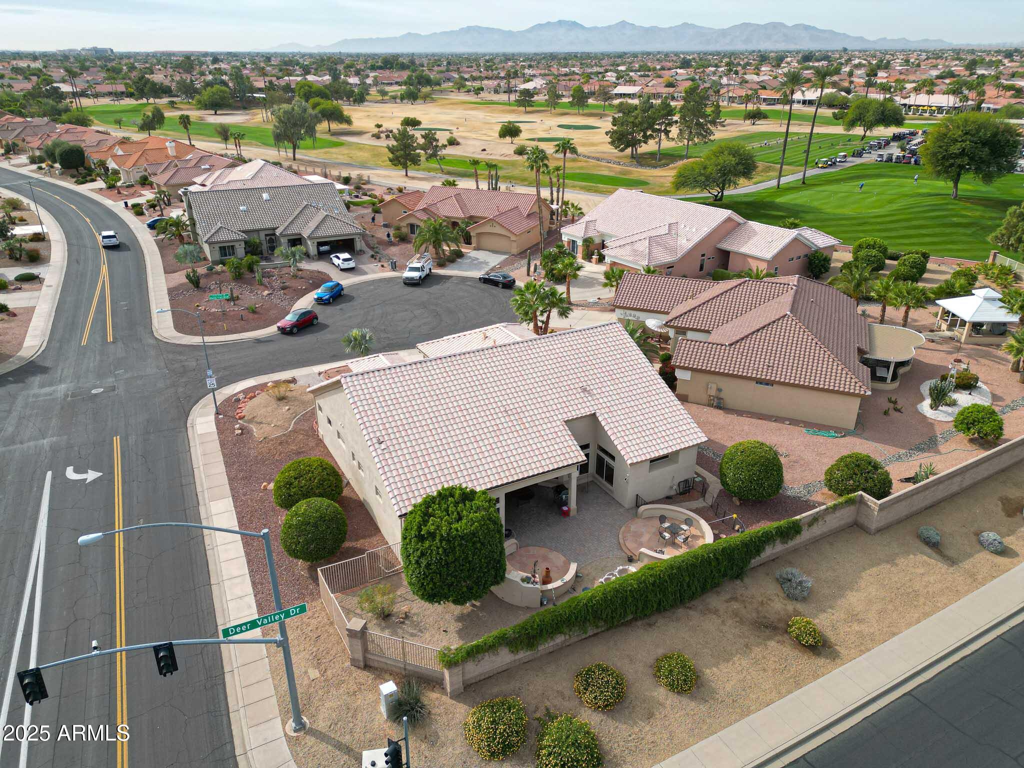 22318 North Dusty Trail Boulevard Sun City West, AZ 85375 - Photo 56 of 66 an aerial view of a house with garden space and ocean view