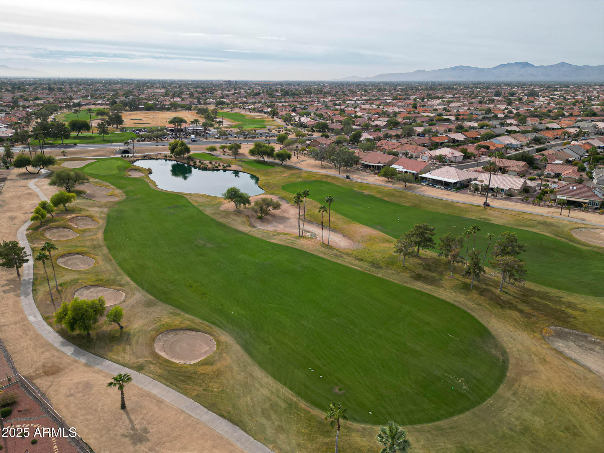 22318 North Dusty Trail Boulevard Sun City West, AZ 85375 - Photo 60 of 66 an aerial view of a residential houses with outdoor space