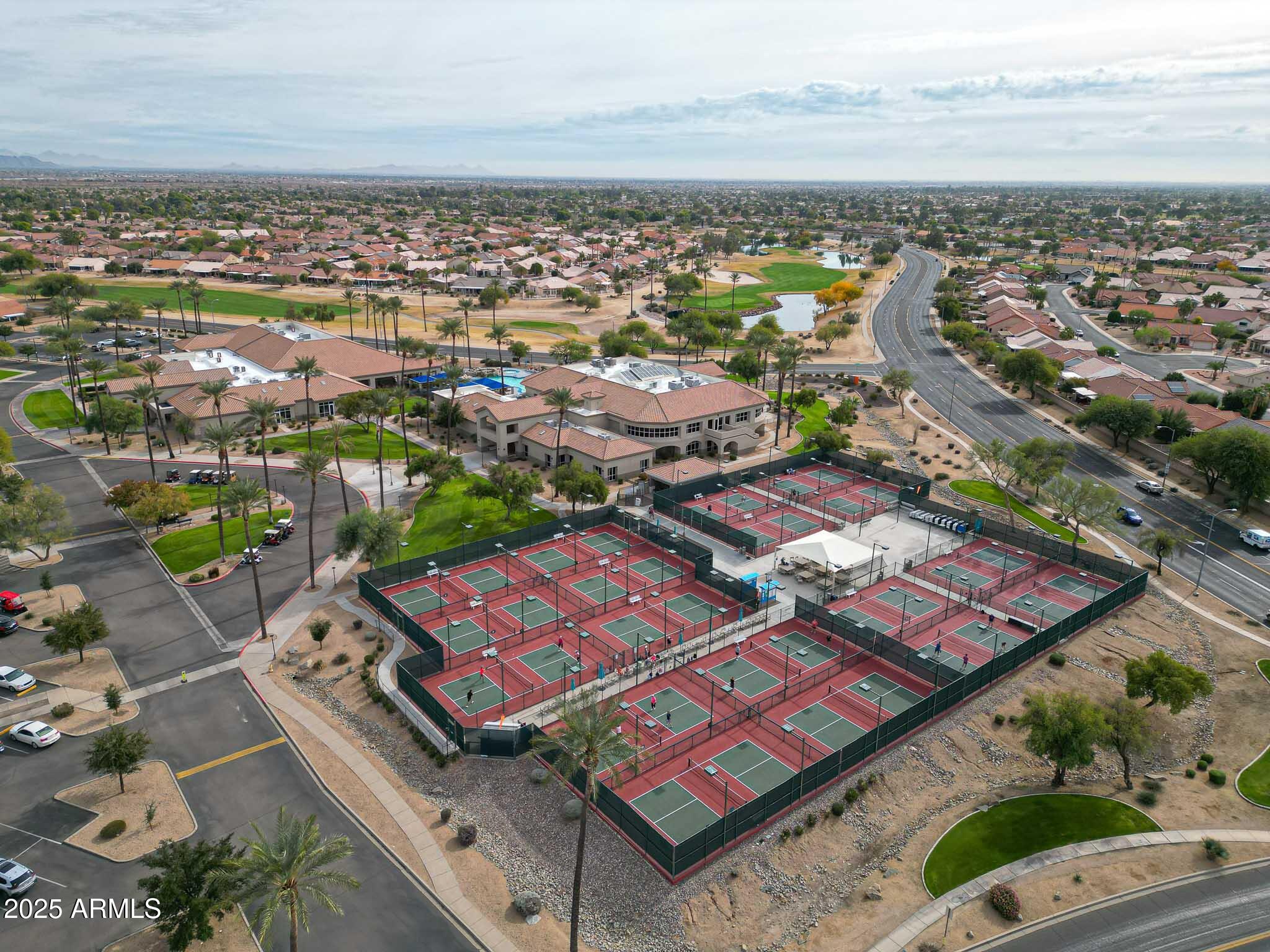 22318 North Dusty Trail Boulevard Sun City West, AZ 85375 - Photo 61 of 66 an aerial view of residential houses with outdoor space