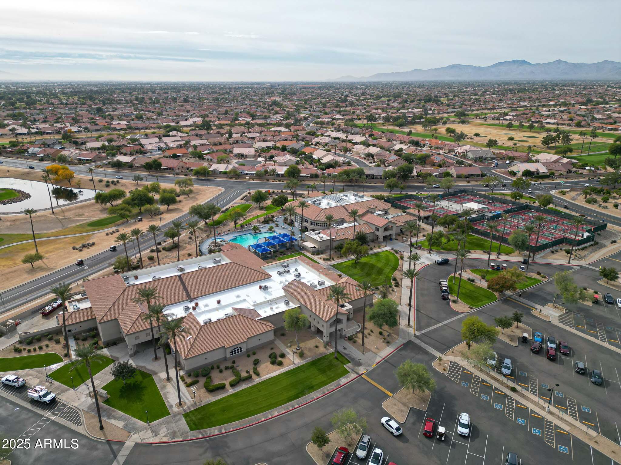 22318 North Dusty Trail Boulevard Sun City West, AZ 85375 - Photo 62 of 66 an aerial view of a city with lots of residential buildings