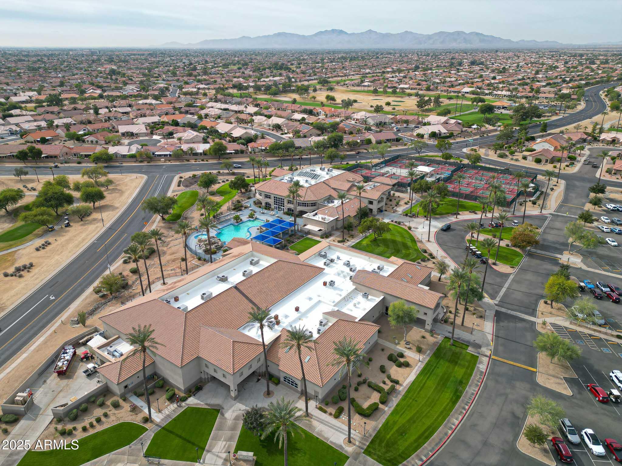 22318 North Dusty Trail Boulevard Sun City West, AZ 85375 - Photo 64 of 66 an aerial view of residential houses with outdoor space