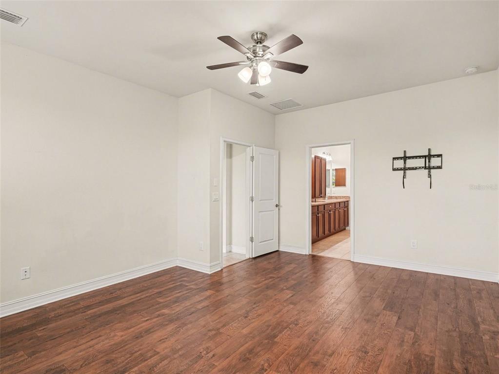4429 Conchfish Lane Osprey, FL 34229 - Photo 9 of 20 a view of a livingroom with wooden floor