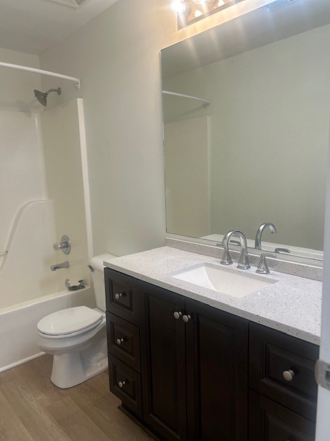 337 Pawnee Trail Murfreesboro, TN 37128 - Photo 21 of 40 a bathroom with a granite countertop toilet sink and mirror