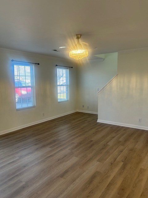 337 Pawnee Trail Murfreesboro, TN 37128 - Photo 6 of 40 a view of an empty room with wooden floor and a window