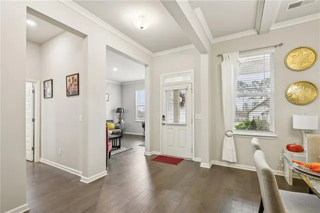a view of empty room and wooden floor