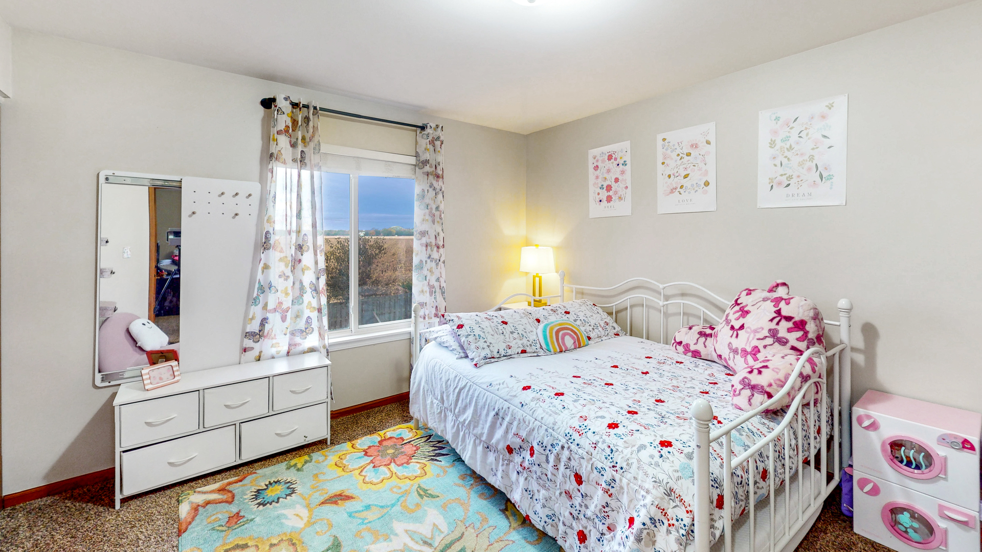 535 Alyssa Street Plano, IL 60545 - Photo 14 of 28 a bedroom with bed and window