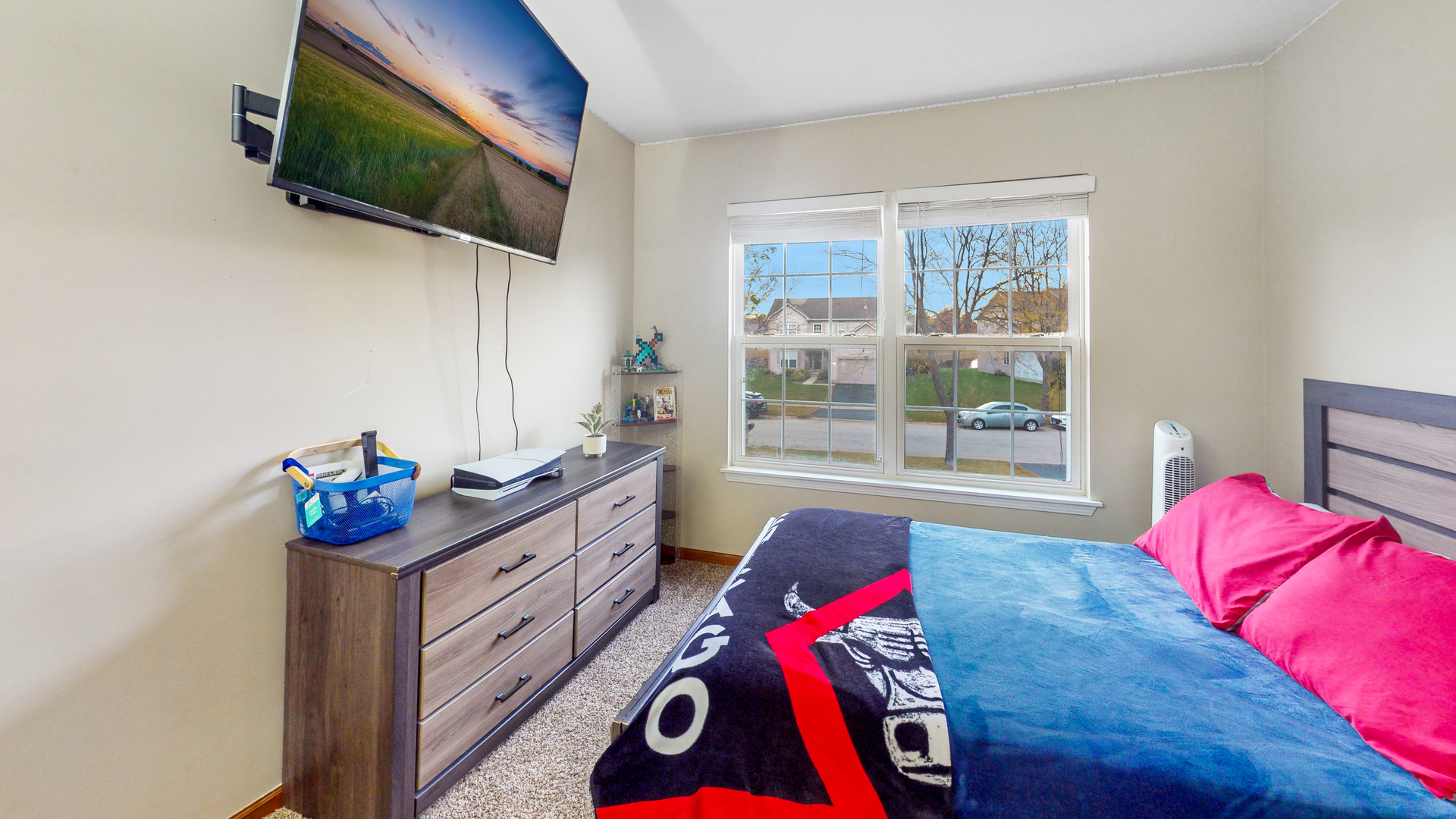 535 Alyssa Street Plano, IL 60545 - Photo 18 of 28 a living room with furniture and a flat screen tv