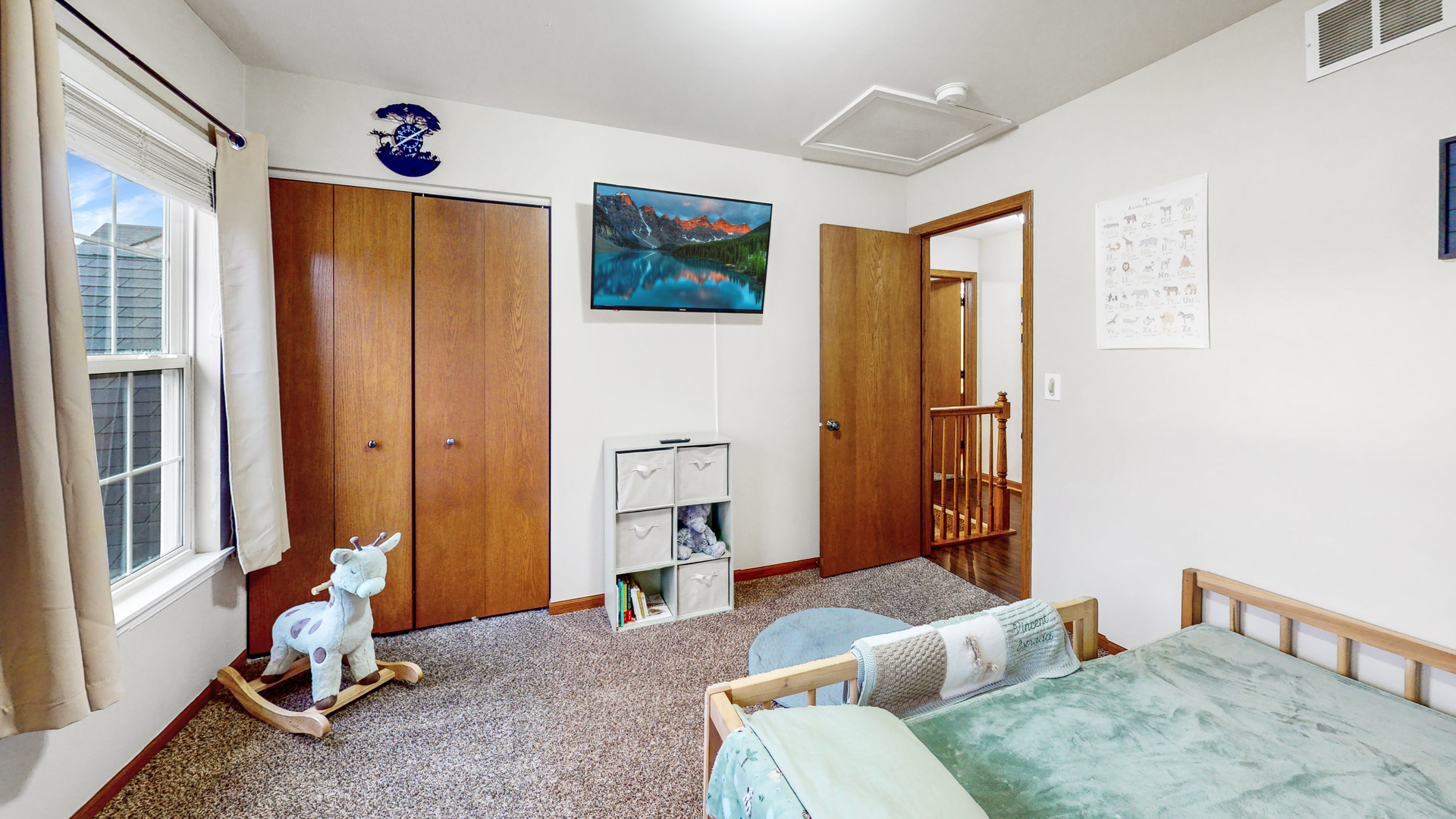 535 Alyssa Street Plano, IL 60545 - Photo 23 of 28 a living room with furniture a window and a wooden floor
