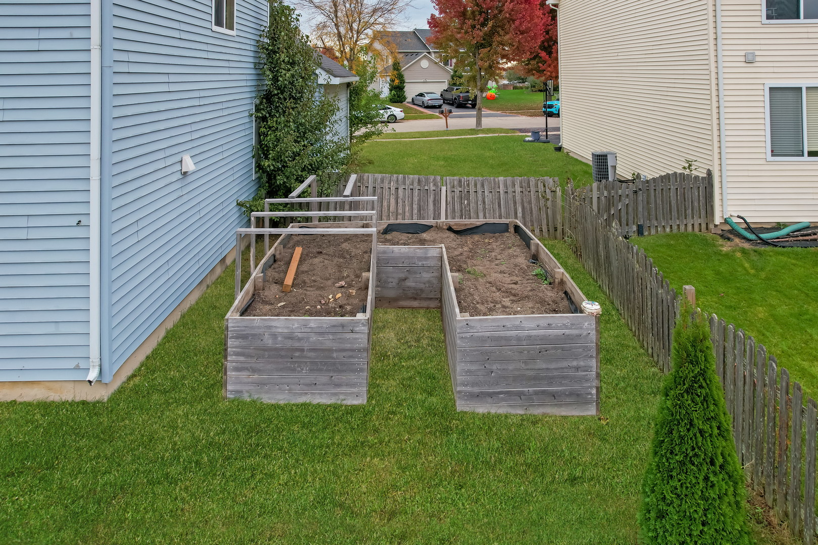 535 Alyssa Street Plano, IL 60545 - Photo 26 of 28 a view of a backyard with a garden
