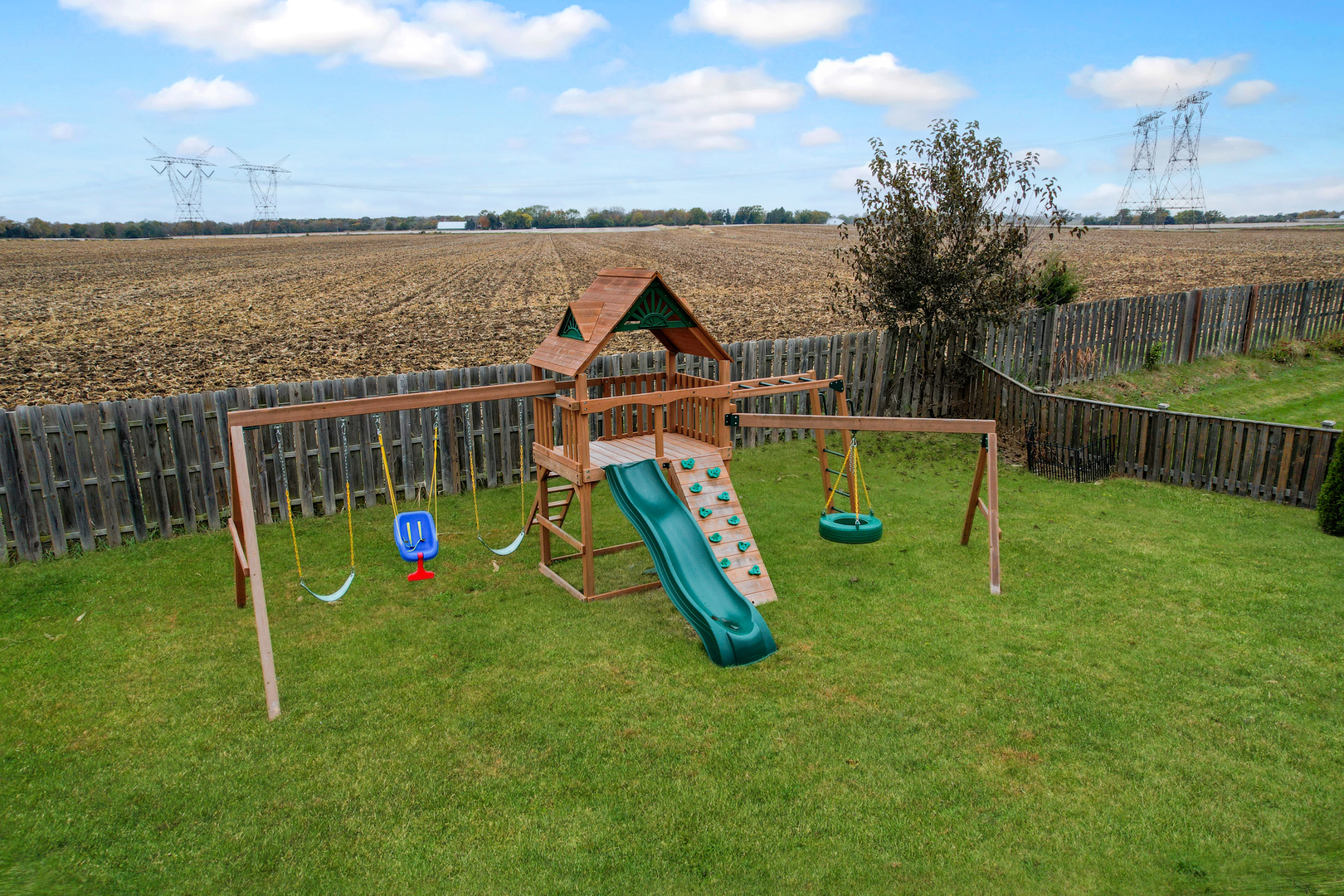 535 Alyssa Street Plano, IL 60545 - Photo 27 of 28 a view of a park with a slide
