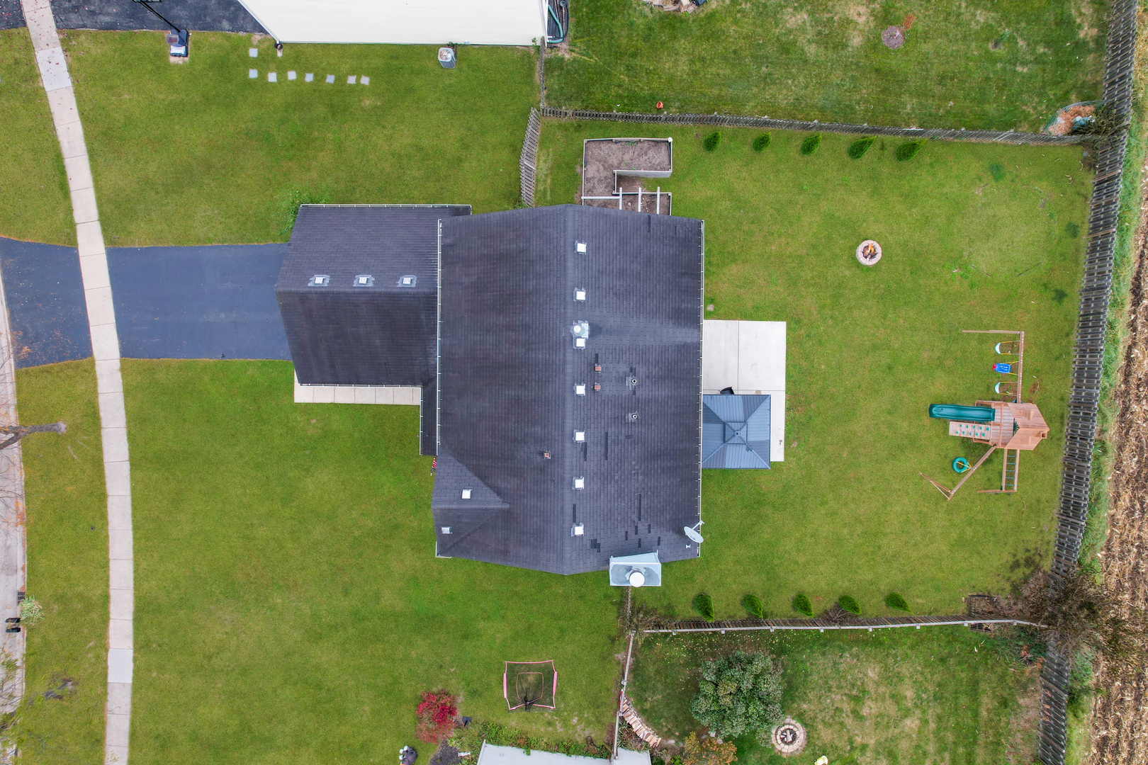 535 Alyssa Street Plano, IL 60545 - Photo 28 of 28 an aerial view of a house with a yard