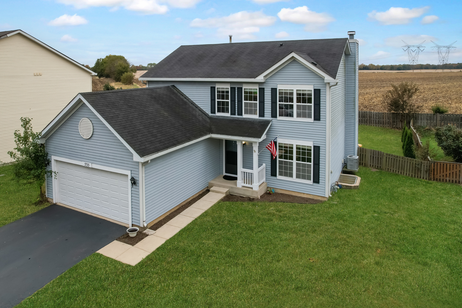 535 Alyssa Street Plano, IL 60545 - Photo 3 of 28 a view of a house with a yard