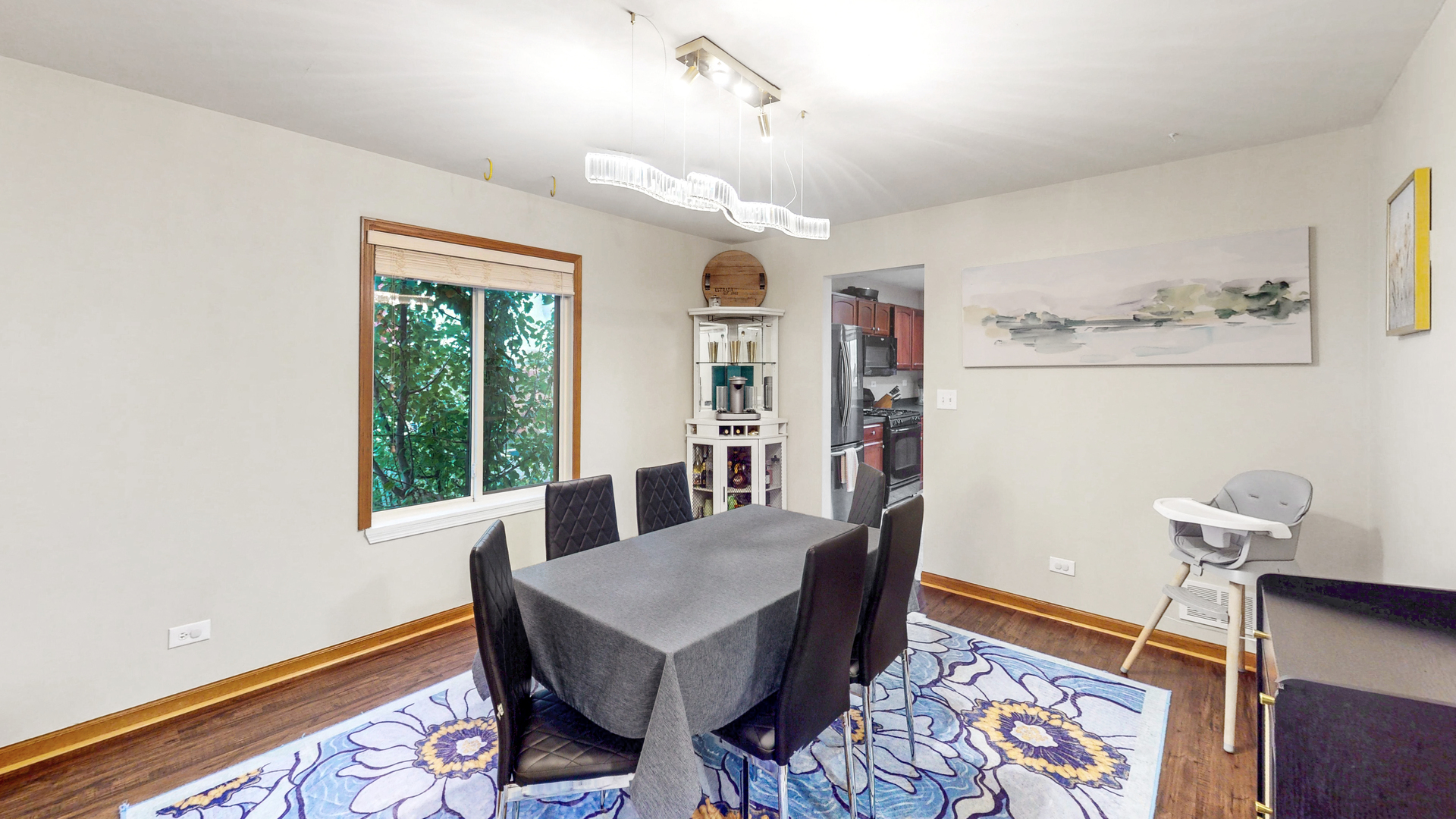 535 Alyssa Street Plano, IL 60545 - Photo 6 of 28 a view of a dining room with furniture and wooden floor