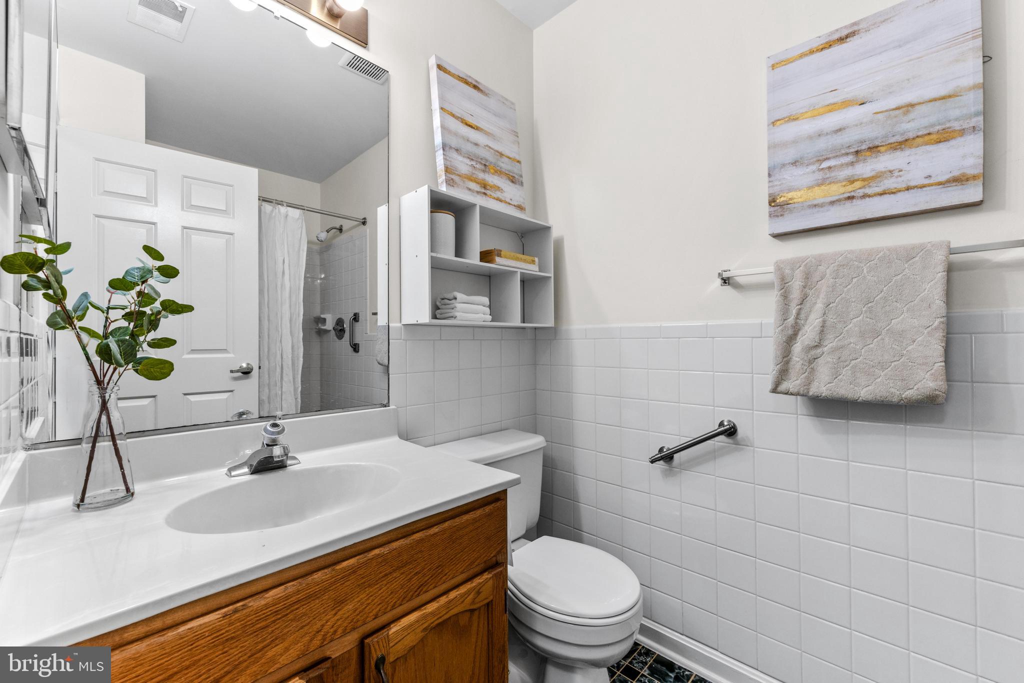 941 Riversedge Circle Annapolis, MD 21401 - Photo 19 of 48 a bathroom with a sink toilet and shower