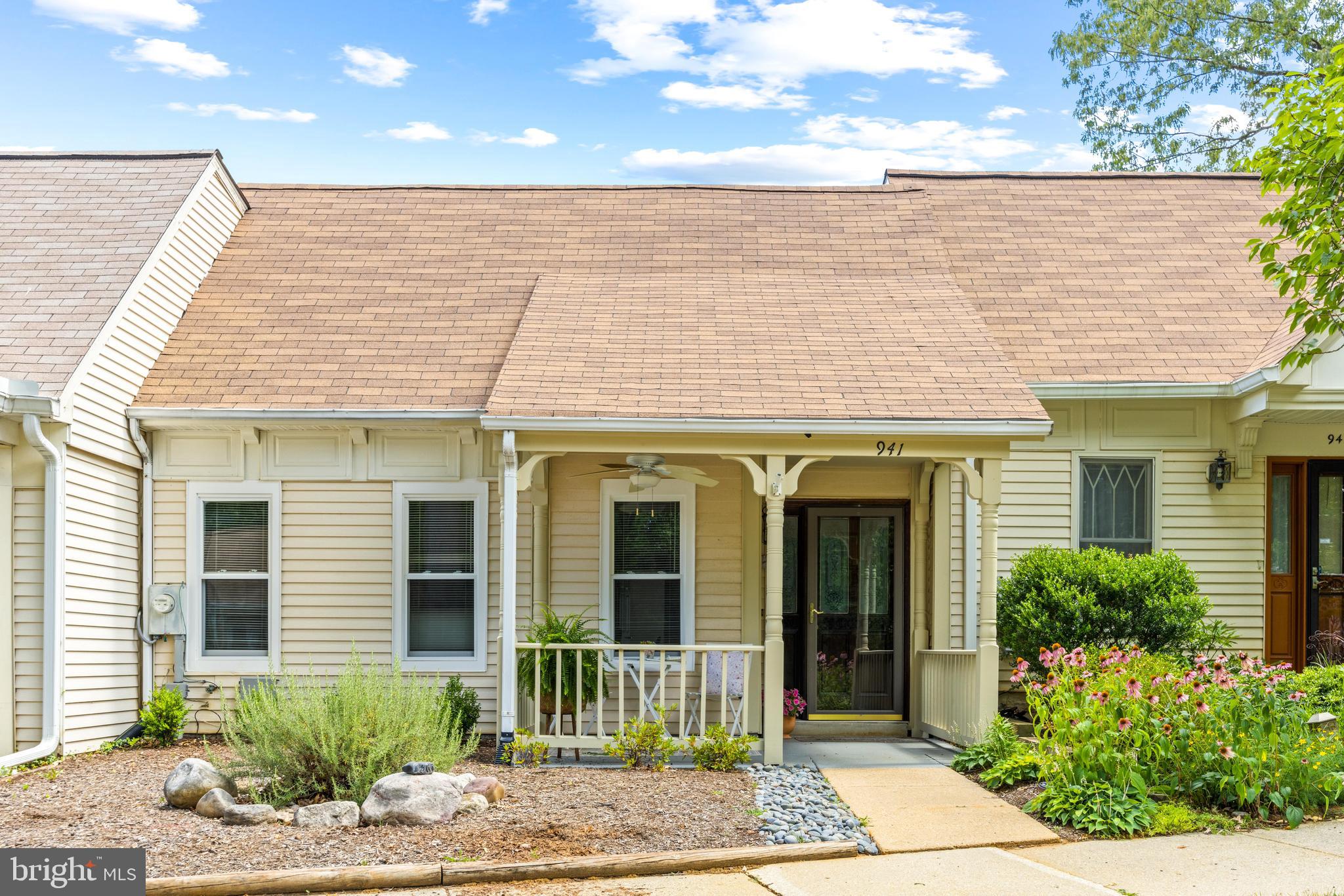 941 Riversedge Circle Annapolis, MD 21401 - Photo 2 of 48 a view of a brick house with potted plants