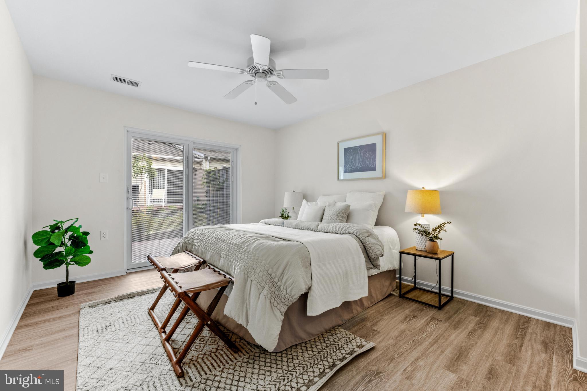 941 Riversedge Circle Annapolis, MD 21401 - Photo 21 of 48 a bedroom with bed and a window