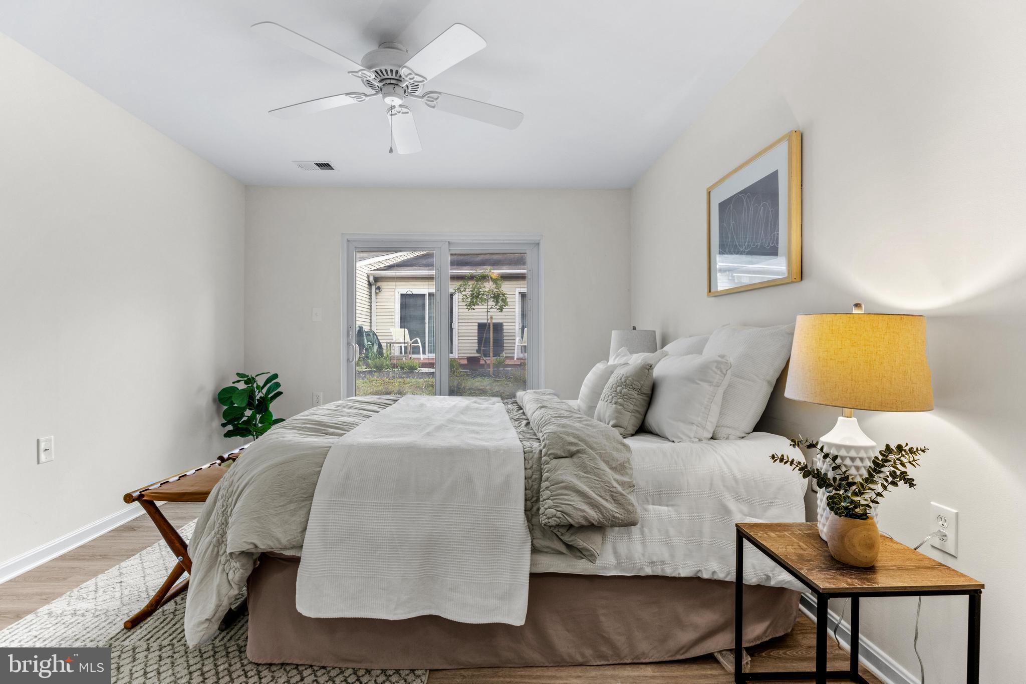 941 Riversedge Circle Annapolis, MD 21401 - Photo 22 of 48 a bedroom with a bed and window