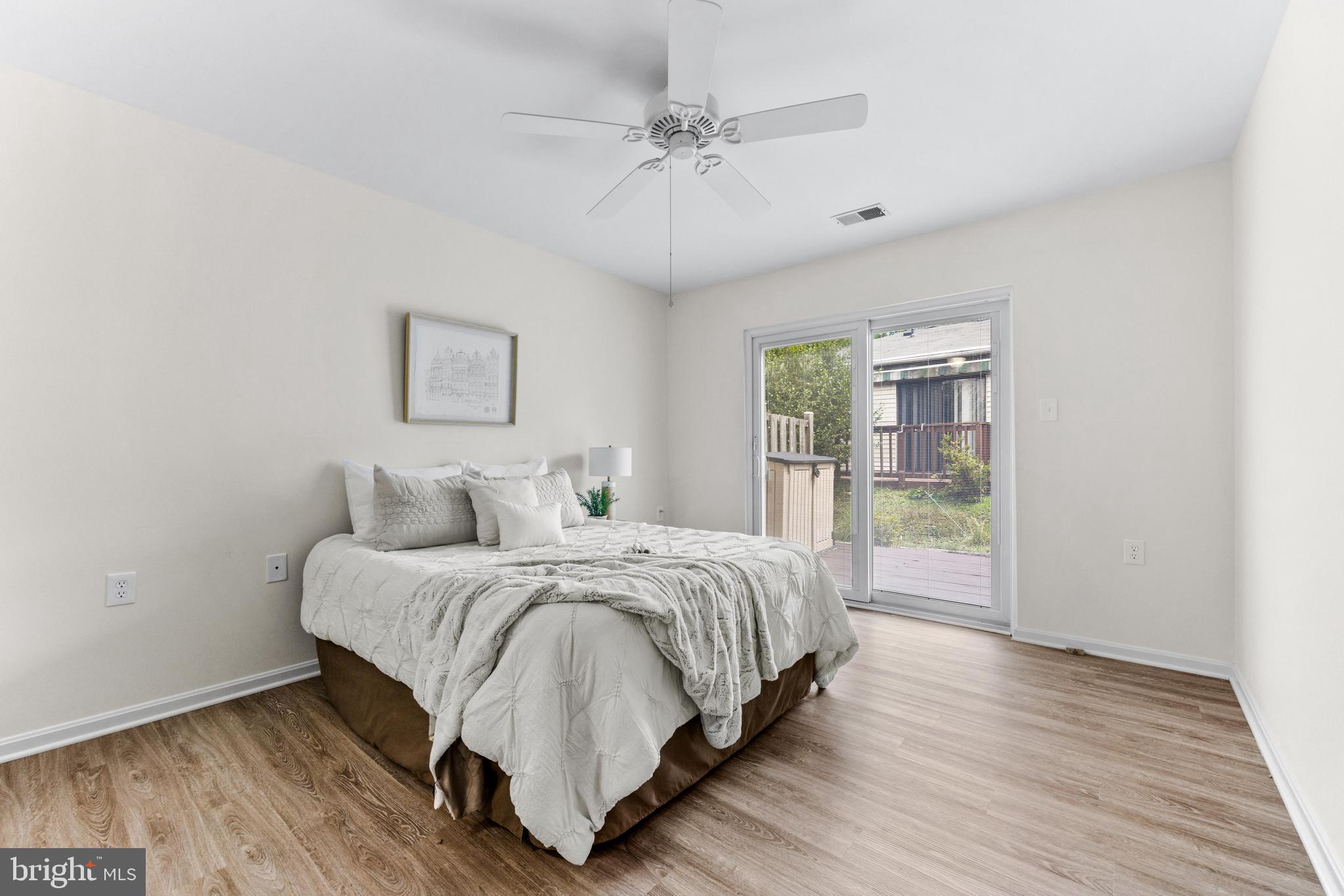941 Riversedge Circle Annapolis, MD 21401 - Photo 25 of 48 a bedroom with a bed and a window