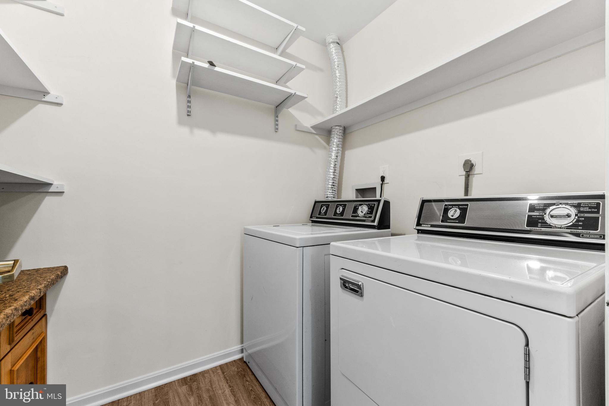 941 Riversedge Circle Annapolis, MD 21401 - Photo 30 of 48 a view of washer and dryer with wooden floor