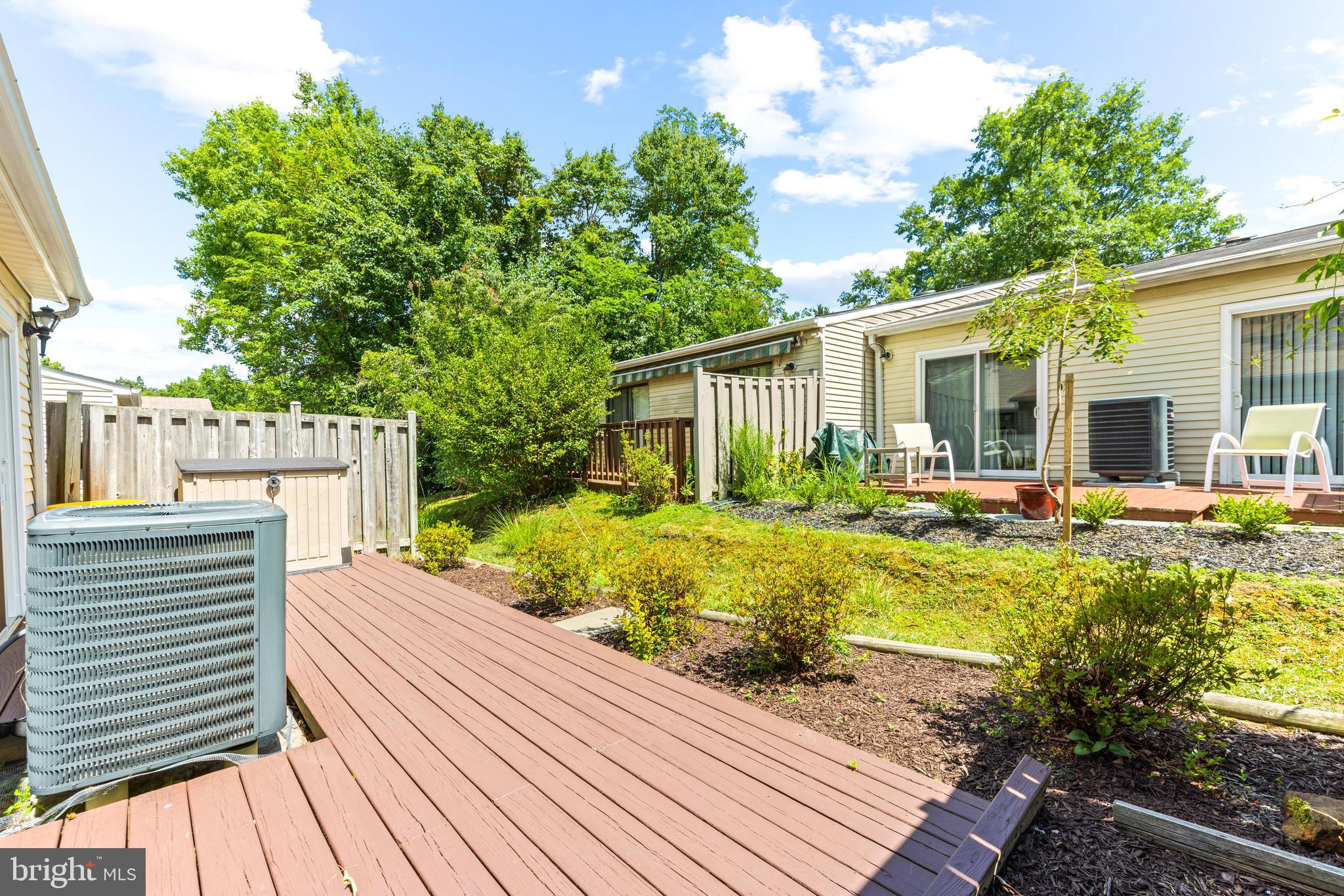 941 Riversedge Circle Annapolis, MD 21401 - Photo 33 of 48 a view of a house with backyard sitting area and swimming pool