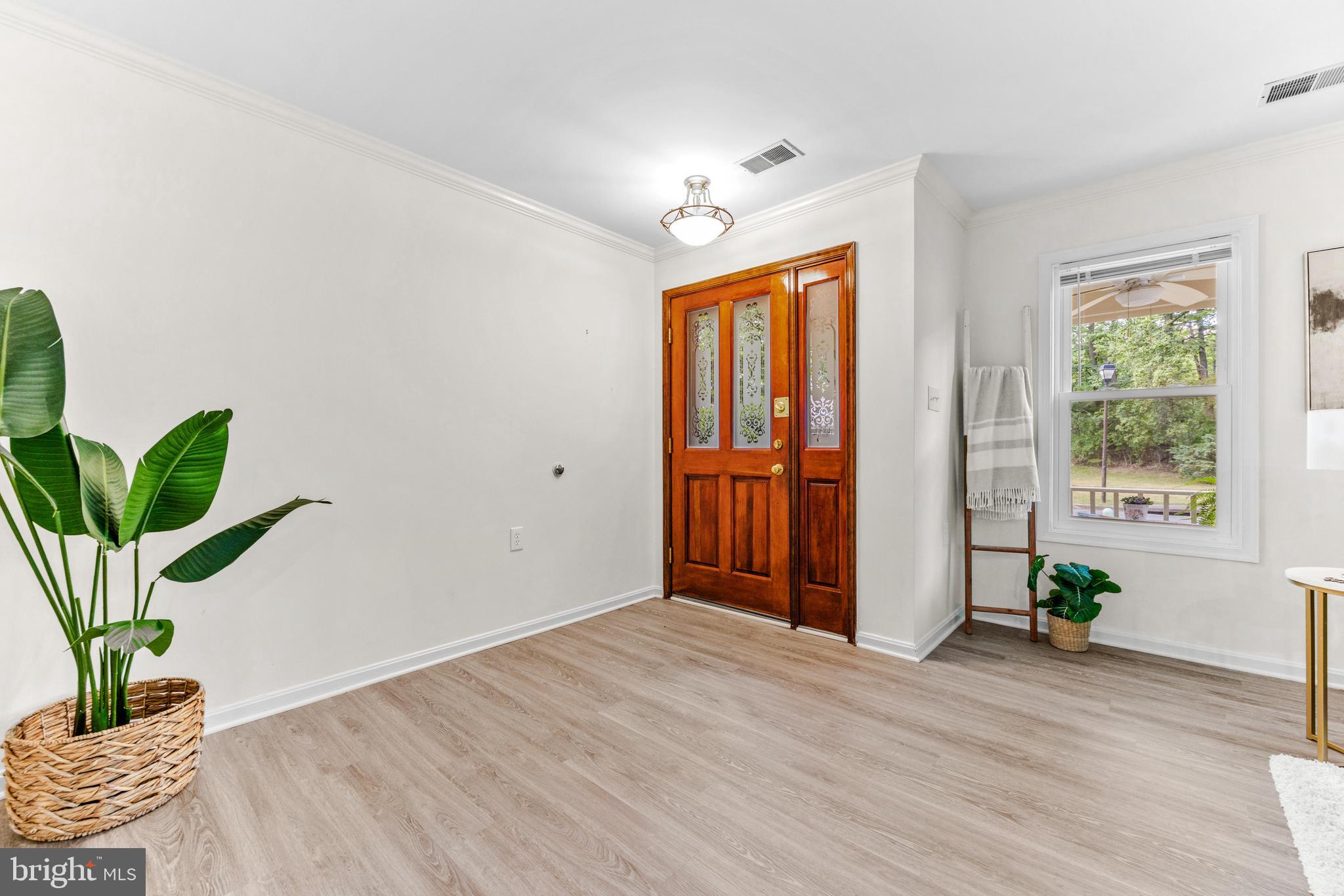 941 Riversedge Circle Annapolis, MD 21401 - Photo 7 of 48 a view of entryway with wooden floor