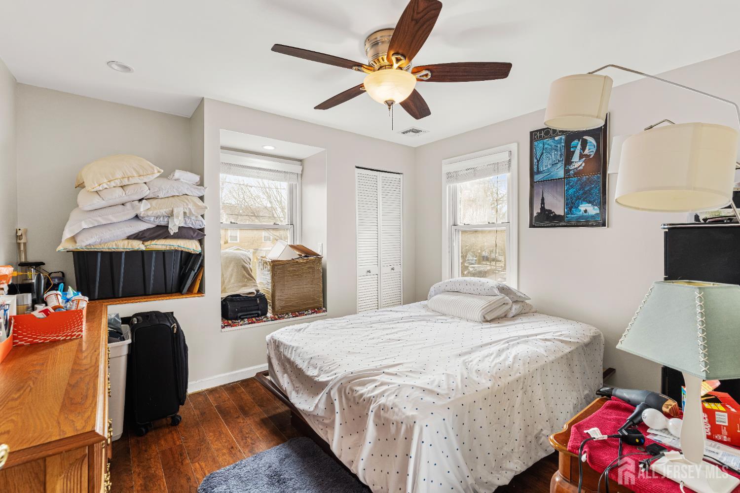 210 2nd Street Dunellen, NJ 08812 - Photo 19 of 42 a bedroom with bed and window
