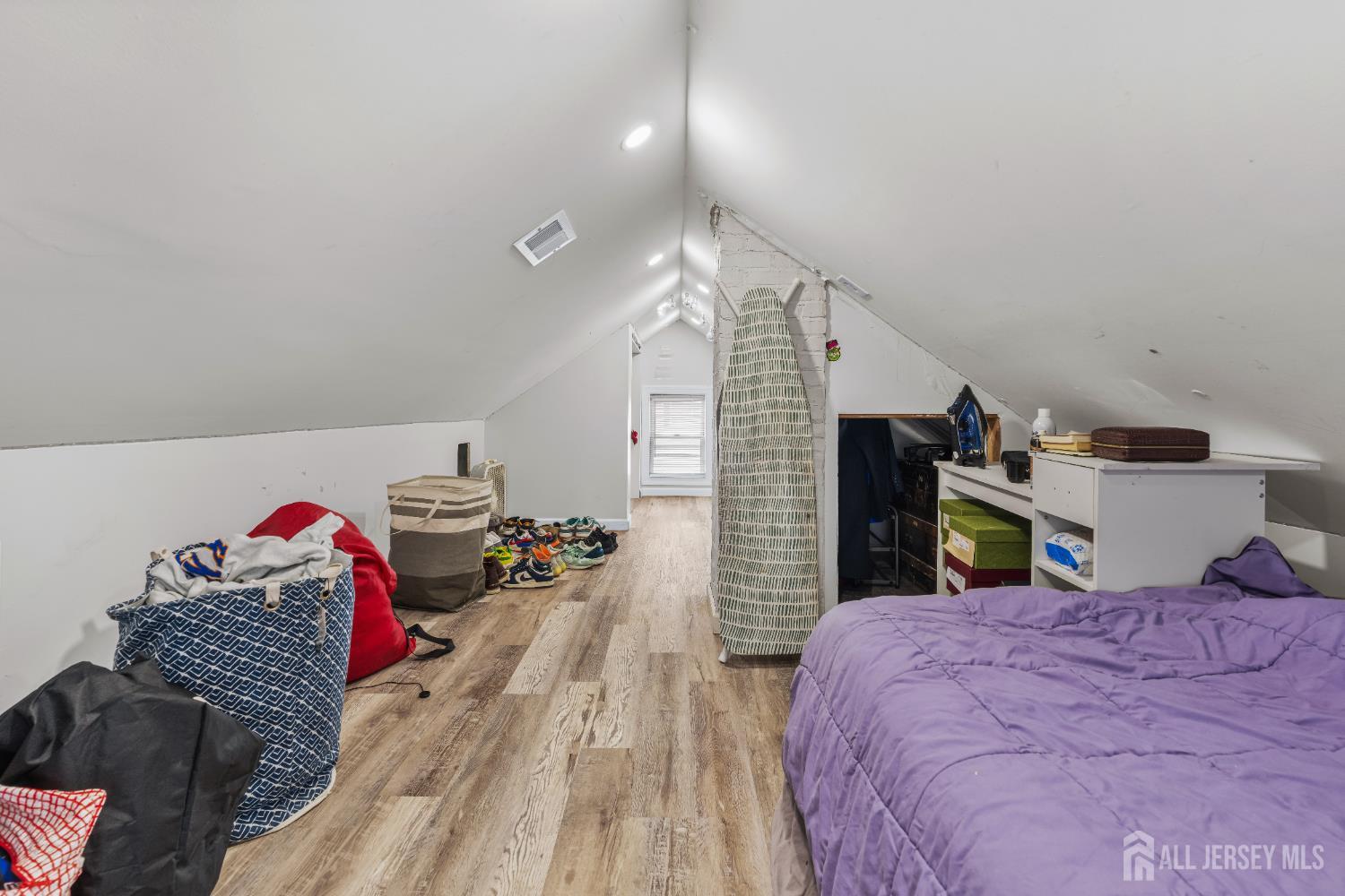 210 2nd Street Dunellen, NJ 08812 - Photo 24 of 42 a bed room with a bed and a tv