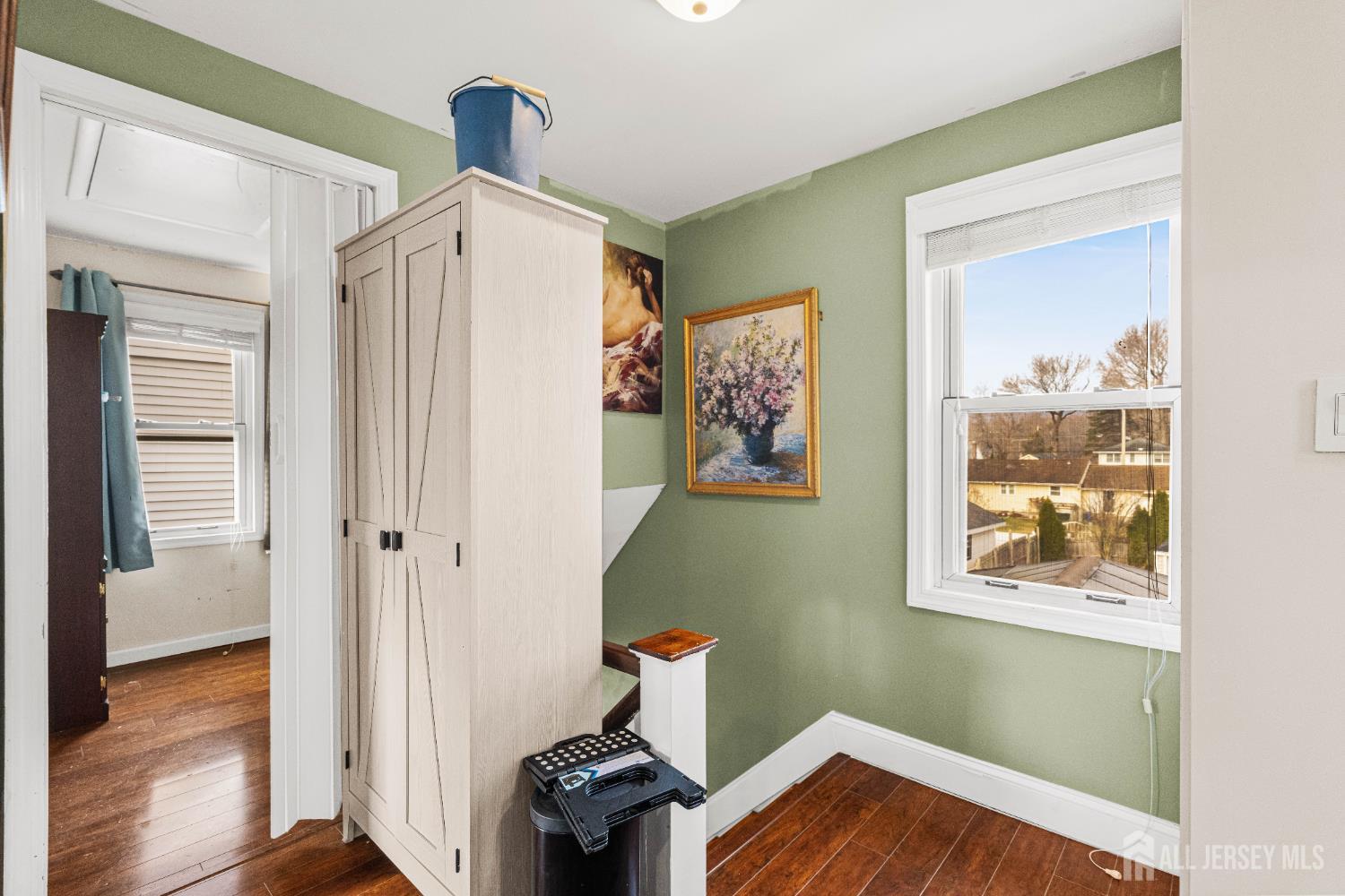 210 2nd Street Dunellen, NJ 08812 - Photo 27 of 42 a view of hallway with wooden floor and bedroom