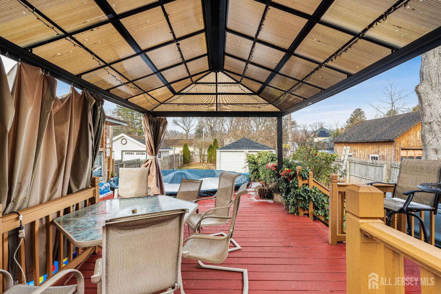 210 2nd Street Dunellen, NJ 08812 - Photo 29 of 42 a living room with furniture windows and wooden floor