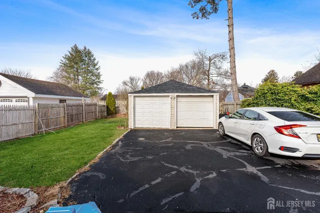 a view of a car in front of a house