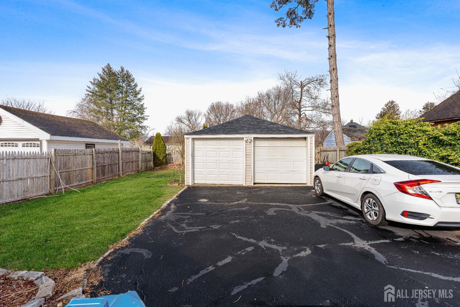 210 2nd Street Dunellen, NJ 08812 - Photo 33 of 42 a view of a car in front of a house