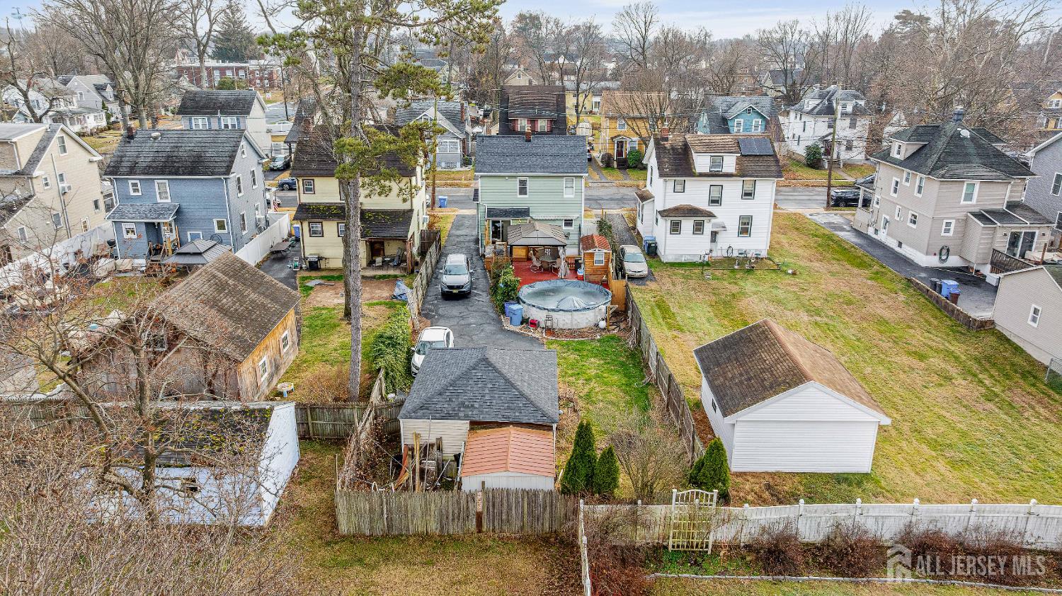 210 2nd Street Dunellen, NJ 08812 - Photo 37 of 42 a aerial view of a swimming pool with outdoor seating