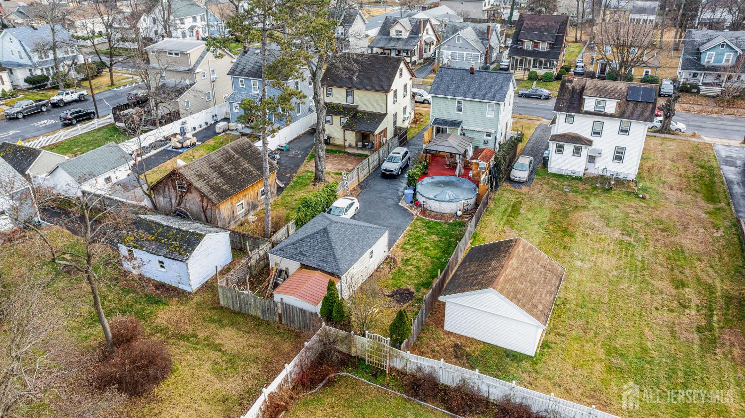 210 2nd Street Dunellen, NJ 08812 - Photo 39 of 42 an aerial view of residential houses with outdoor space