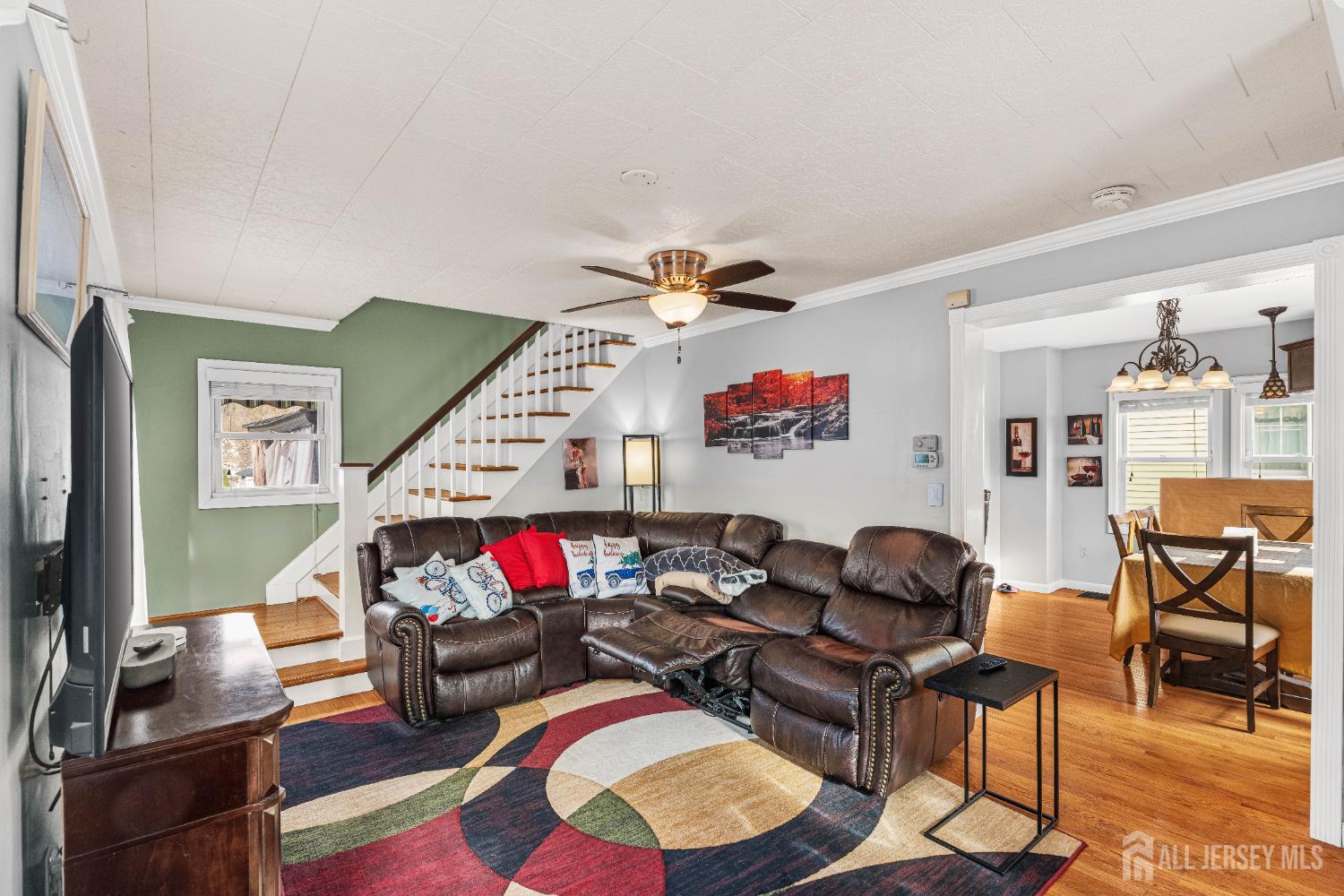 210 2nd Street Dunellen, NJ 08812 - Photo 4 of 42 a living room with furniture and wooden floor