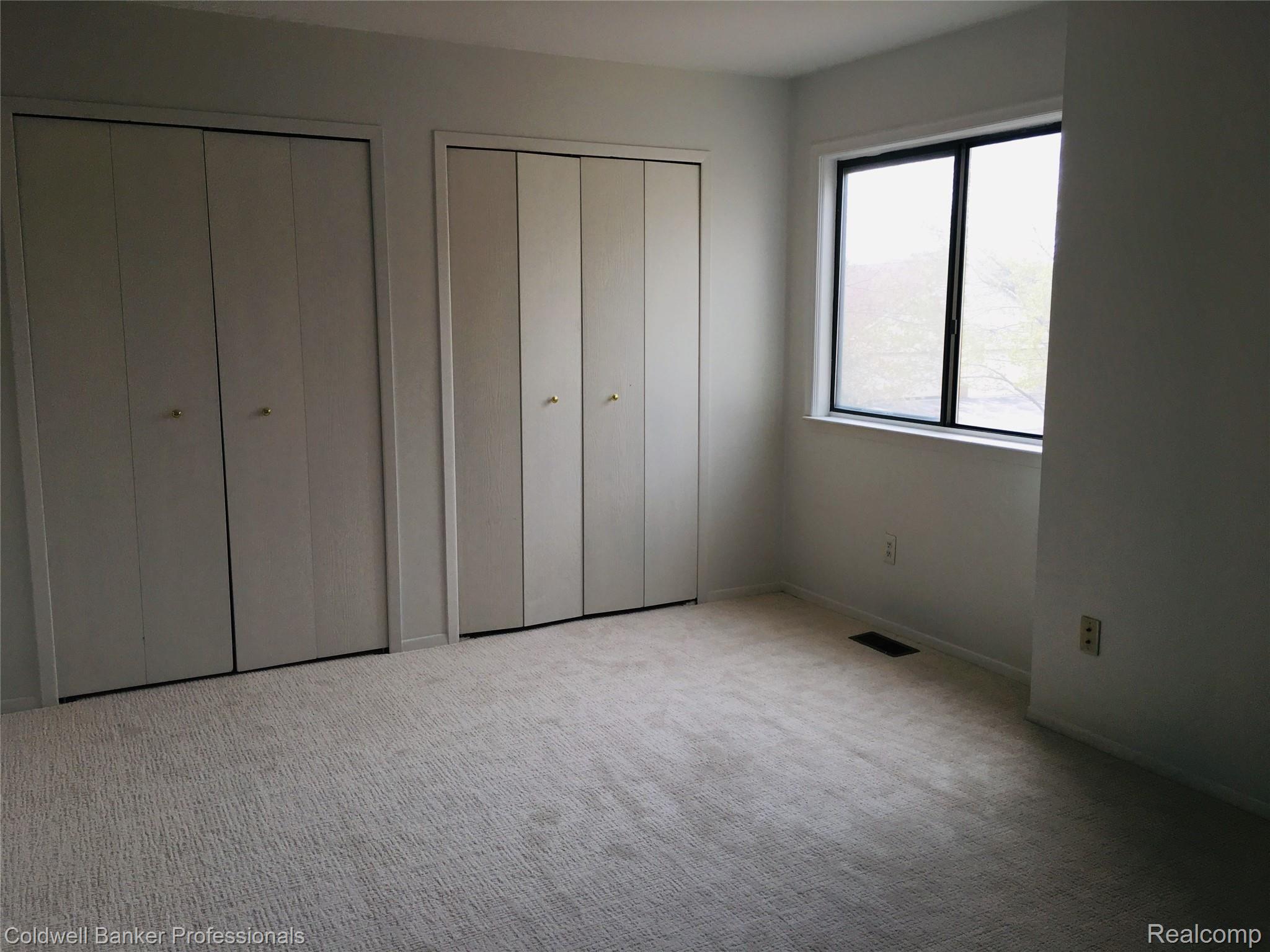 676 Tennyson, Unit 13 Rochester, MI 48307 - Photo 10 of 22 Master view 2