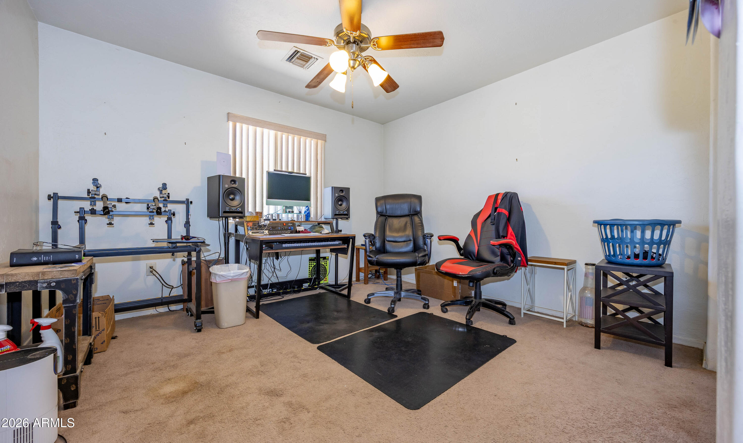 4575 South Kino Road Sierra Vista, AZ 85650 - Photo 24 of 25 a view of a workspace with furniture and a window