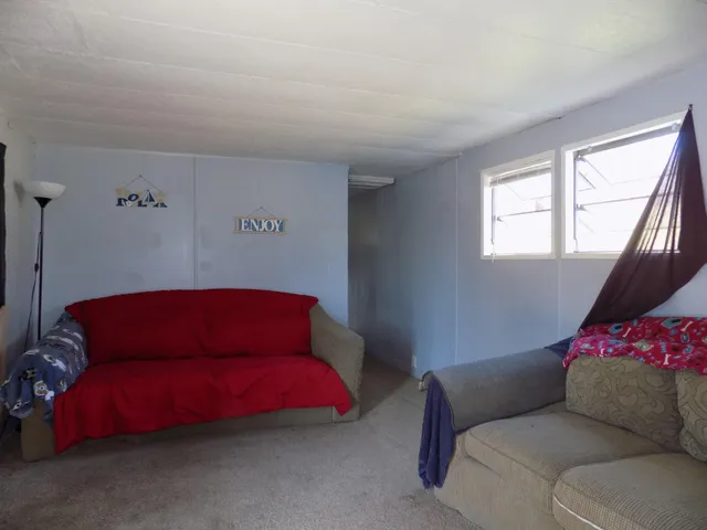 a couch sitting in a living room with a couch